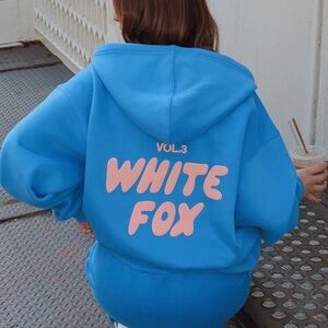 White Fox Boutique Blue Hoodie with Pink Logo